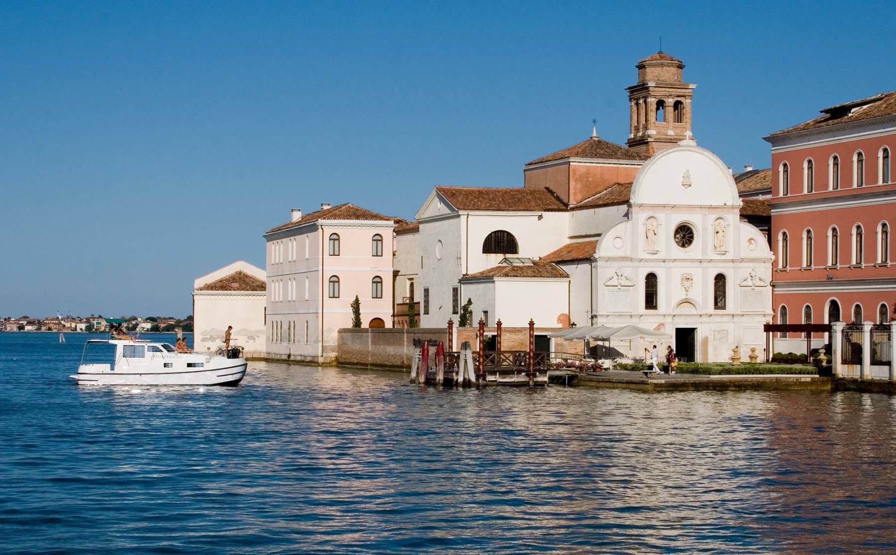 Houseboat rendez vous fantasia navigation in Venice island of San Servolo historical monuments art